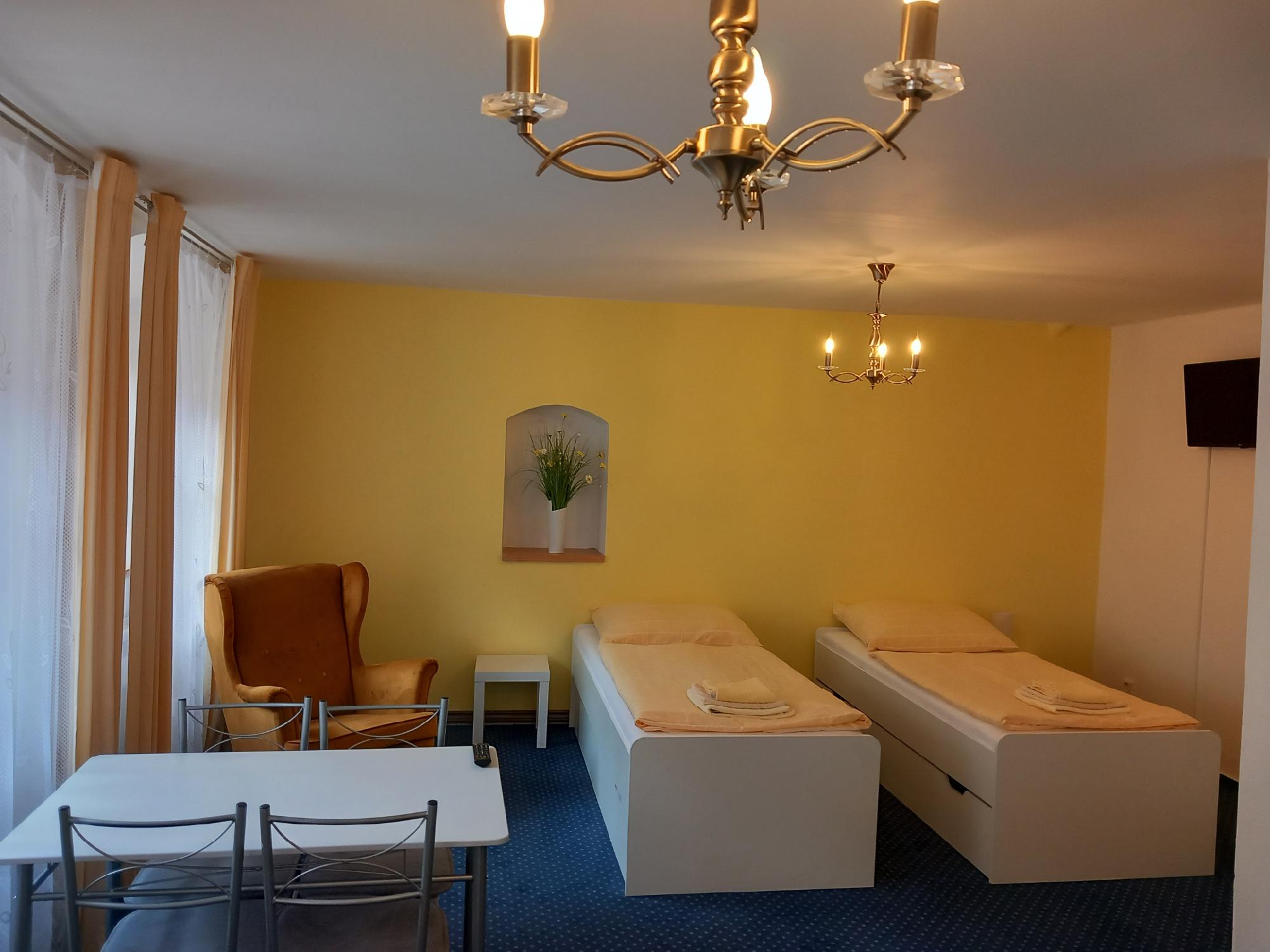 Třílůžkový pokoj